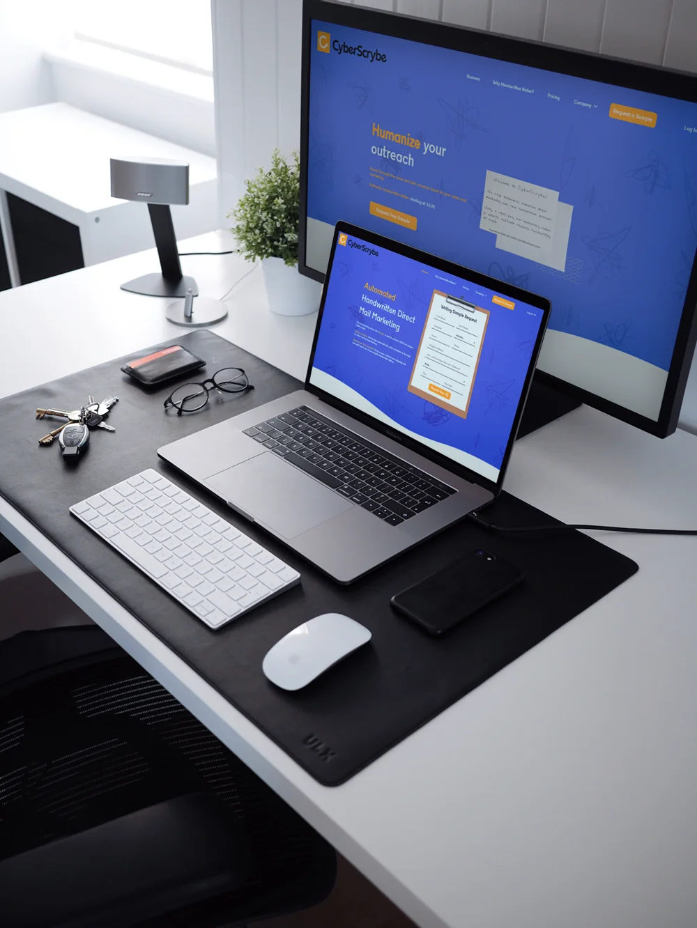 Cyberscrybe website on desktop and Macbook